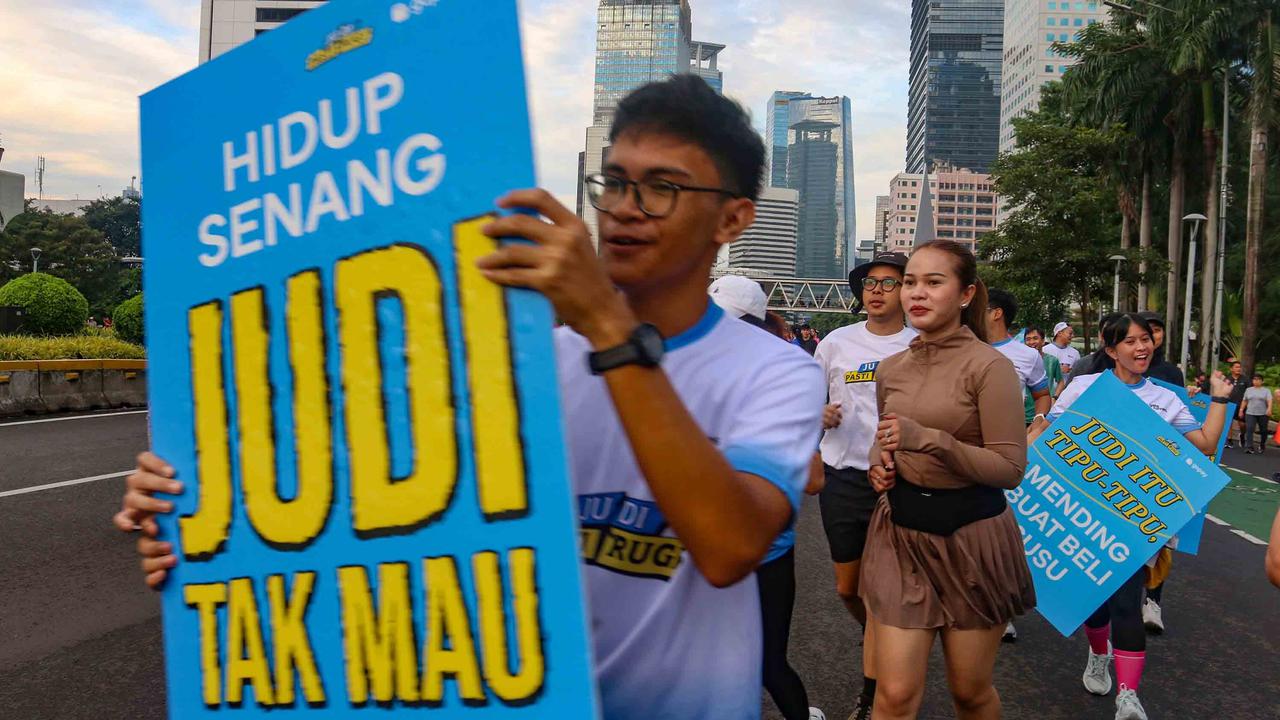 FOTO; Kampanye ‘Judi Pasti Rugi’ Sapa Warga Jakarta: Serukan Bahaya Judi Online