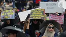 Buruh dari berbagai aliansi melakukan aksi damai dalam rangka peringatan May Day atau Hari Buruh Internasional di kawasan Patung Kuda, Jakarta, Rabu (1/5/2024). (Liputan6.com/Angga Yuniar)