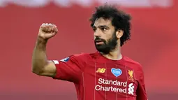 1. Mohamed Salah (Liverpool) - Mohamed Salah, sangat ahli meneror pemain belakang lawan dengan kecepatan, dribel yang taktis dan penyelesaian akhir yang brilian. Hanya selama tiga musim bersama The Reds, dia membukukan 91 gol dan 27 assist dalam 144 penampilan. (AFP/paul Ellis/pool)