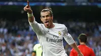 Selebrasi pemain Real Madrid, Gareth Bale, setelah mencetak gol ke gawang Manchester City pada semifinal Liga Champions, Rabu (4/5/2016). (EPA/Peter Powell)