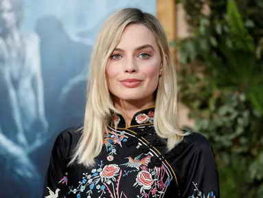 Aktris, Margot Robbie menghadiri premier film "The Legend of Tarzan" di Hollywood, California, (27/6). Aktris cantik ini berperan sebagai Jane Porter, kekasih Tarzan yang diperankan oleh aktor tampan Alexander Skarsgard. (REUTERS/Danny Moloshok)