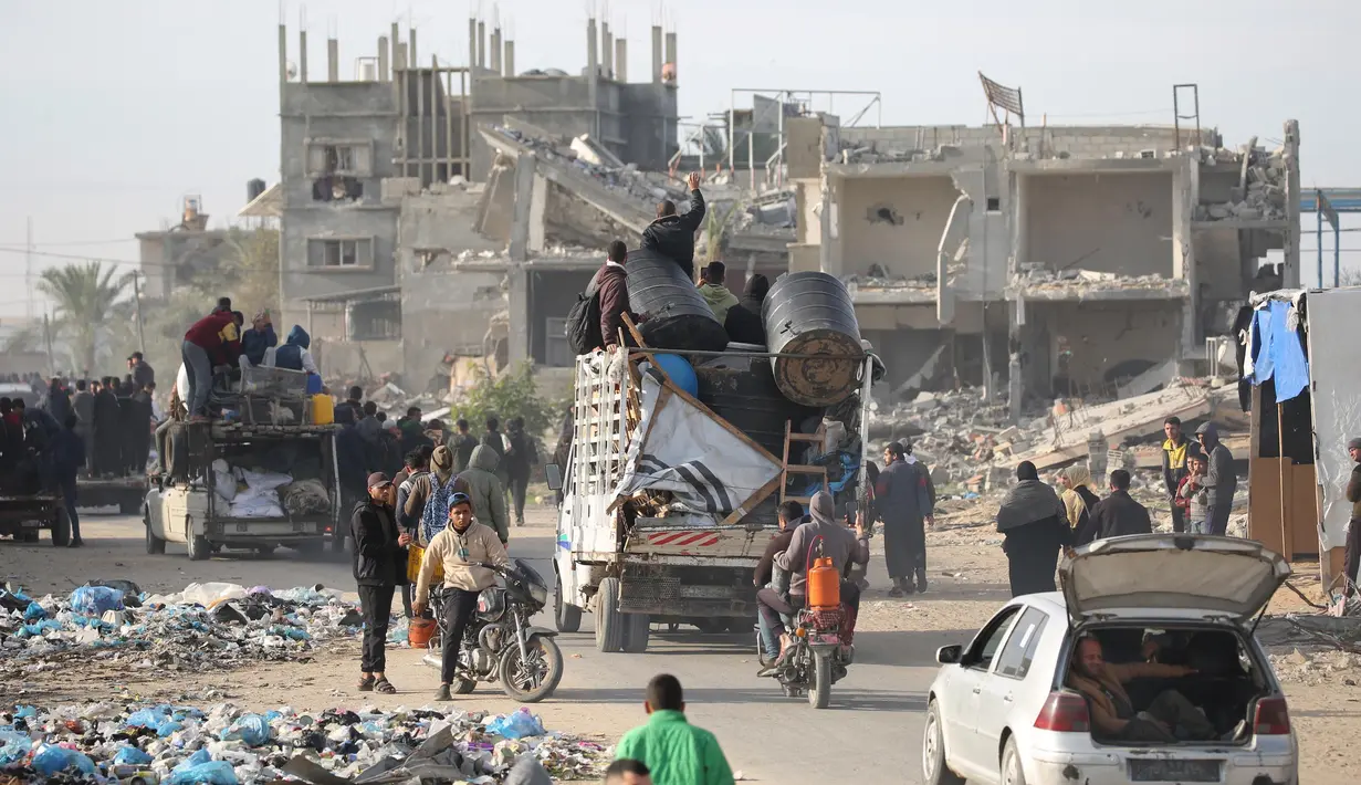 Kesepakatan gencatan senjata antara Israel dan kelompok militan Palestina, Hamas, disambut meriah oleh ribuan pengungsi Palestina yang selama ini hidup berpindah-pindah. (Eyad BABA/AFP)