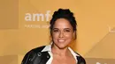 Aktris AS Michelle Rodriguez berpose saat menghadiri amfAR Gala Los Angeles 2022, menghormati Paramount Pictures dan penyanyi AS Kelly Rowland, di Pacific Design Center di West Hollywood, California, pada 3 November 2022. (Jon Kopaloff/Getty Images/AFP)