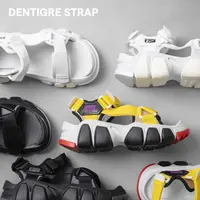 Dentigre adalah koleksi sandal dari Onitsuka Tiger dengan ciri khas sol yang modis dan fungsional. Dentigre Strap menggabungkan sandal bertali dengan sol bergaya yang khas. Dentigre Strap memiliki penutup kait dan loop, yang cocok dipadu padan dengan outfit apapun.