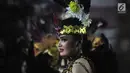 Peserta pagelaran Semarang Night Carnival melintas di ruas Jalan Imam Bonjol, Rabu (3/7/2019). Pagelaran melibatkan peserta dari Asosiasi Pemerintah Kota Seluruh Indonesia (APEKSI) yang tengah melaksanakan rapat kerja nasional ke-XIV di Kota Semarang. (Liputan6.com/Gholib)