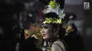 Peserta pagelaran Semarang Night Carnival melintas di ruas Jalan Imam Bonjol, Rabu (3/7/2019). Pagelaran melibatkan peserta dari Asosiasi Pemerintah Kota Seluruh Indonesia (APEKSI) yang tengah melaksanakan rapat kerja nasional ke-XIV di Kota Semarang. (Liputan6.com/Gholib)