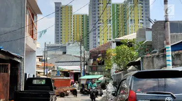 Pemandangan proyek Rusunawa Pasar Rumput yang hampir selesai pengerjaannya di Jakarta, Selasa (16/7/2019). Proyek yang dimulai sejak 2016 lalu tersebut memiliki 1.984 unit hunian serta 1.314 kios. (Liputan6.com/Immanuel Antonius)