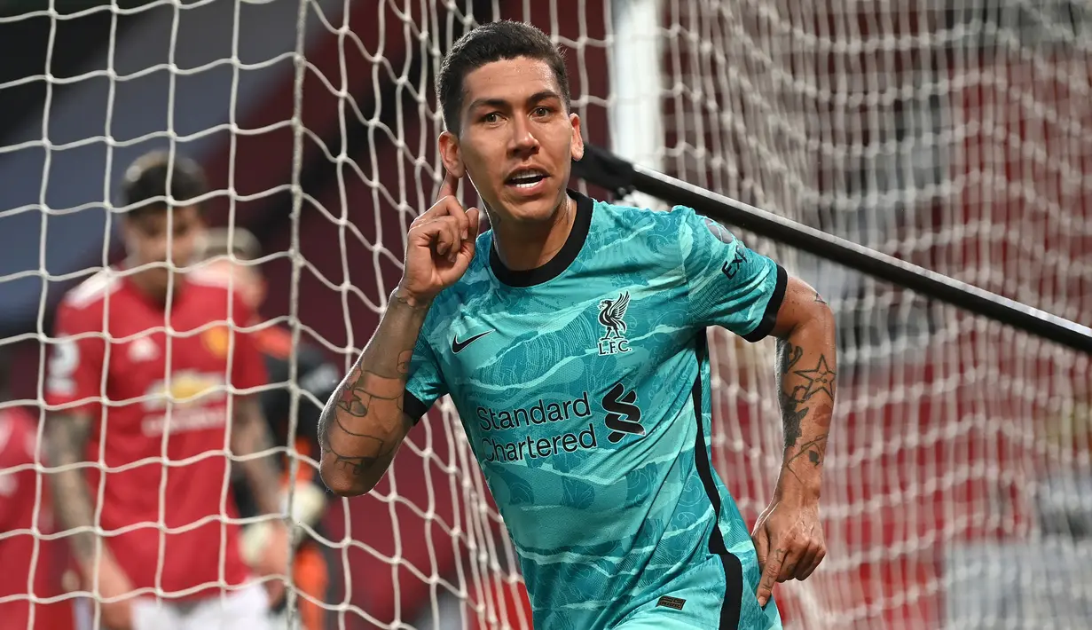 Roberto Firmino. Gelandang Liverpool yang didatangkan dari Hoffenheim pada awal musim 2015/2016 ini telah 6 musim bersama Liverpool hingga kini. Ia sudah mengemas 65 gol di ajang Premier League, yang tertinggi di antara para pemain Brasil lainnya. (AFP/Michael Regan/Pool)