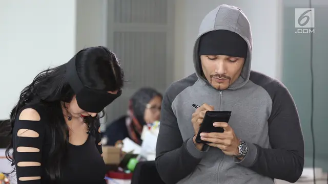 Romy Rafael dan istrinya, Ury Kartha