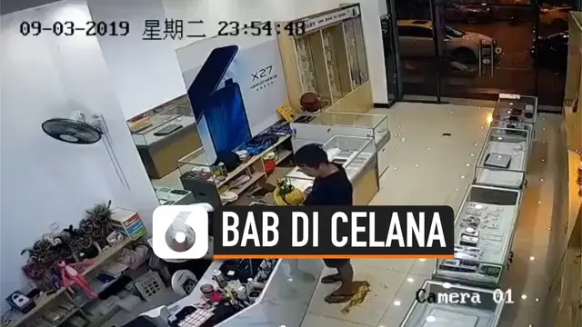 Sebuah kamera CCTV memperlihatkan seorang pria tak sengaja BAB di celana dan mengotori lantai toko. Untuk menutupi rasa malu, pria tersebut terlihat tetap santai dan membaurkan kotoran tinja tersebut.