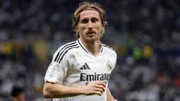 Hal tersebut terungkap pada 22 Mei 2025, Luka Modric mengatakan pada bahwa ia akan meninggalkan klub raksasa Spanyol itu. Tampak dalam foto, gelandang Real Madrid asal Kroasia, Luka Modric bereaksi selama pertandingan sepak bola final Piala Interkontinental FIFA 2024 melawan Pachuca dari Meksiko di Stadion Lusail, Doha, Qatar pada 18 Desember 2024. (KARIM JAAFAR/AFP)