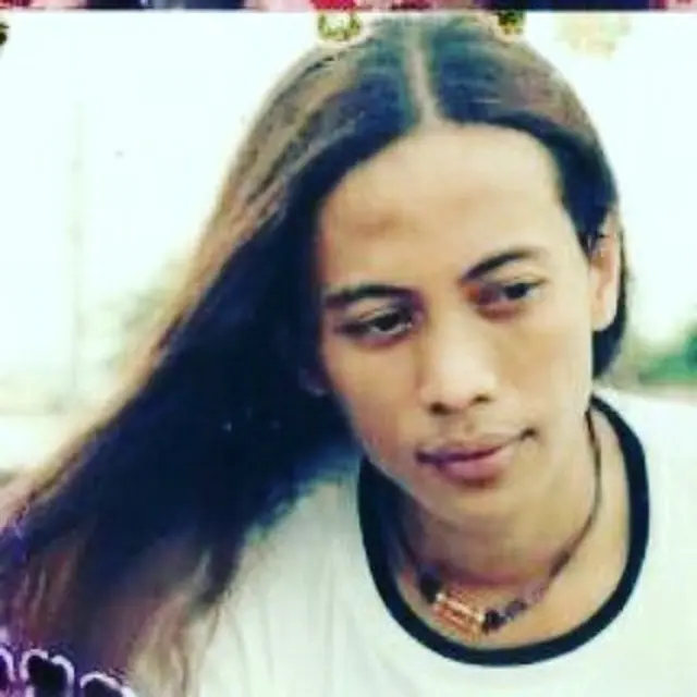 Begini potret lawas Opick saat masih berambut gondrong.