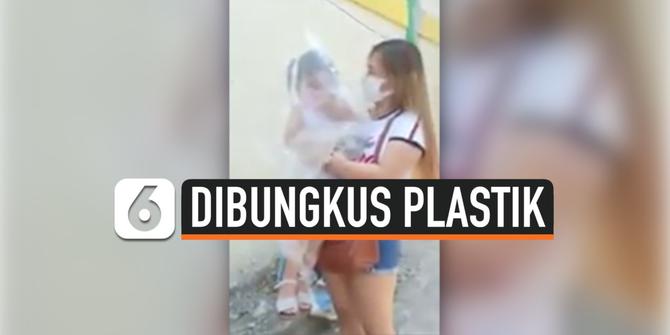 VIDEO: Mengharukan, Perawat Pasien Corona Peluk Anaknya Yang Dibungkus Plastik