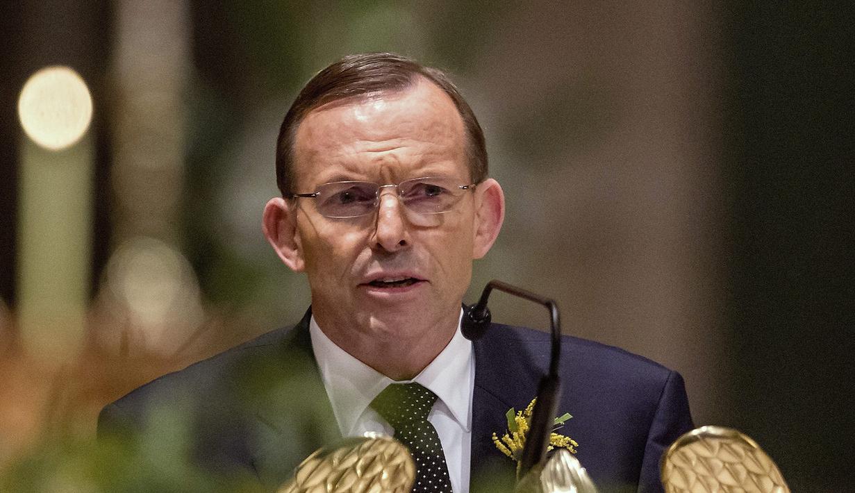 Kamis (7/8/14), PM Australia Tony Abbott saat memberikan sambutan di acara hari berkabung nasional untuk mengenang korban tewas MH17 di Ukraina. (REUTERS/Mark Dadswell)