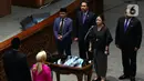 Ketua DPR Puan Maharani, bersama Wakil Ketua DPR  Muhaimin Iskandar, Azis Syamsuddin dan Rachmad Gobel  menerima laporan Ketua Badan Legislasi Supratman Andi Agtas pada saat Rapat Paripurna di Kompleks Parlemen Senayan, Jakarta, Rabu (22/1/2020). (Liputan6.com/Johan Tallo)