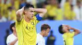 Cristiano Ronaldo masih belum bisa memberikan gelar juara bergengsi untuk klub Arab Saudi Al Nassr. Terbaru Al Nassr kalah 0-1 dari klub Jepang Gamba Osaka di final AFC Champions League 2 atau Liga Champions Asia 2 (ACL 2) pada Minggu (17/5/2026) dini hari WIB. (AFP/Fayez Nureldine)