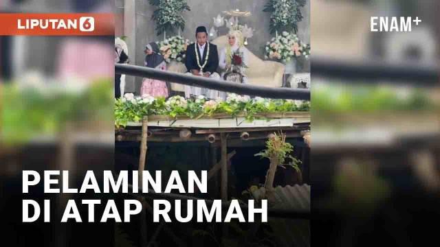 Sebuah pemandangan berbeda terekam dalam sebuah resepsi pernikahan. Pasalnya sebuah pelaminan berdiri di ketinggian, sejajar dengan atap rumah. Momen tersebut direkam oleh MUA pengantin dan menuai komentar warganet yang heran.