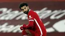1. Mohamed Salah (Liverpool) - Posisi pemain asal Mesir ini belum tergoyahkan dari urutan puncak daftar top skor sementara Liga Inggris 2020/2021. Mohamed Salah sendiri telah mencetak 13 gol dari 17 laga Liverpool musim ini. (AFP/Clive Brunskill/pool)