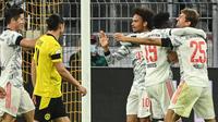Bayern Munchen meraih kemenangan 3-1 atas Borussia Dortmund pada laga Piala Super Jerman 2021 di Signal Iduna Park, Rabu (18/8/2021) dini hari WIB. Hasil itu membuat Bayern berhak atas trofi Piala Super Jerman. (AFP/Ina Fassbender)