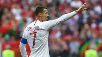 Selebrasi kapten Timnas Portugal, Cristiano Ronaldo usai mencetak gol ke gawang Maroko pada matchday kedua Grup B Piala Dunia 2018. (Byline / Source / Credit Francisco LEONG / AFP)
