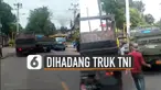 Sopir truk pengangkut ini sedang tidak beruntung.