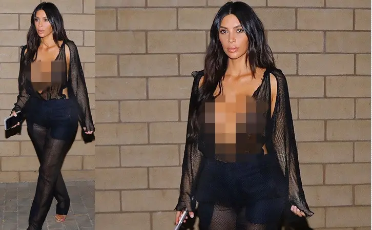 Kim Kardashian mengenakan pakaian seperti jaring ikan (Dailymail)