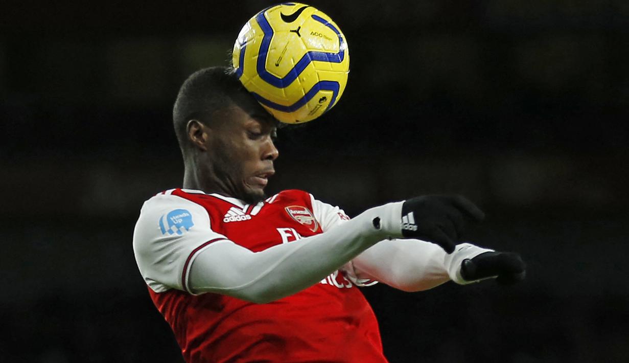 Nicolas Pepe. Sayap kanan Pantai Gading berusia 27 tahun ini baru saja bergabung dengan OGC Nice di awal musim 2022/2023 dengan status pinjaman dari Arsenal. Arsenal sendiri mendatangkannya dari LOSC Lille dengan nilai transfer 80 juta euro atau kini setara Rp1,2 triliun pada awal musim 2019/2020, saat Unai Emery menjalani musim keduanya bersama The Gunners. (AFP/Ian Kington)