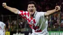 Selebrasi striker Kroasia, Davor Suker setelah mencetak gol ke gawang Jamaika dalam laga Piala Dunia 1998 di Felix Bollaert Stadium, Lens (14/6/1998). Yugoslavia menjadi juara pada Piala Dunia U-20 edisi 1983 di Meksiko saat diperkuat oleh Davor Suker yang menyumbang total 6 gol selama turnamen. (AFP/Olivier Morin)