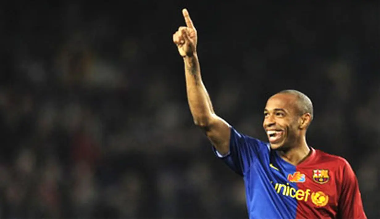 Barcelona's French forward Thierry Henry celebrates a goal against Valencia during their Spanish League match on December 6, 2008 at Camp Nou stadium in Barcelona. AFP PHOTO/LLUIS GENE
