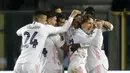 Pemain Real Madrid merayakan gol yang dicetak Ferland Mendy ke gawang Atalanta pada leg pertama babak 16 besar Liga Champions di Stadion Gewiss, Kamis (25/2/2021) dini hari WIB. Real Madrid susah payah menang 1-0 atas Atalanta lewat satu-satunya gol yang dicetak Ferland Mendy (AP Photo/Luca Bruno)