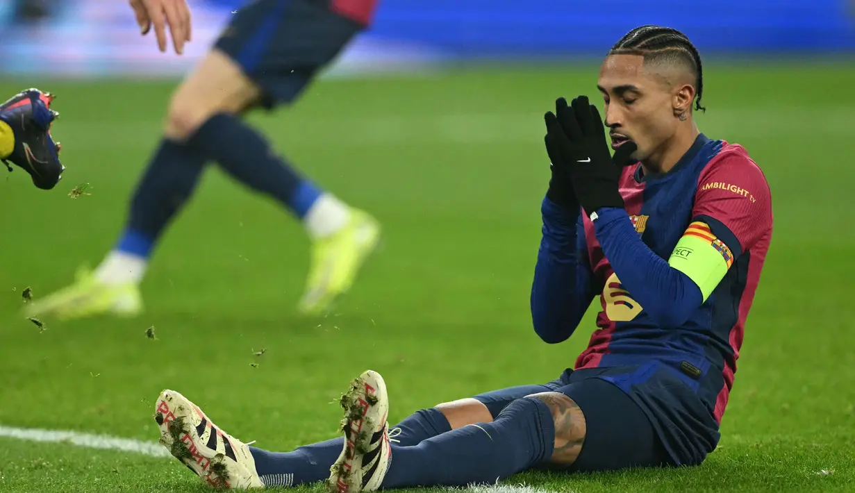 Pada menit ke-53, Raphinha membuka keunggulan Barcelona atas Borussia Dortmund. (INA FASSBENDER/AFP)
