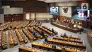 Suasana Rapat DPR RI masa persidangan III tahun sidang 2022-2023 di kompleks parlemen, Senayan, Jakarta, Selasa (10/1/2023). Rapat paripurna perdana pada tahun 2023 ini, dipimpin Wakil Ketua DPR Rachmat Gobel. (Liputan6.com/Faizal Fanani)
