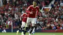 Penyerang Manchester United, Cristiano Ronaldo berlari saat bertanding melawan Newcastle United pada pertandingan Liga Inggris di stadion Old Trafford, Sabtu (11/9/2021). Ronaldo mencetak dua gol dan mengantar MU menang atas Newcastle 4-1. (AP Photo/Rui Vieira)
