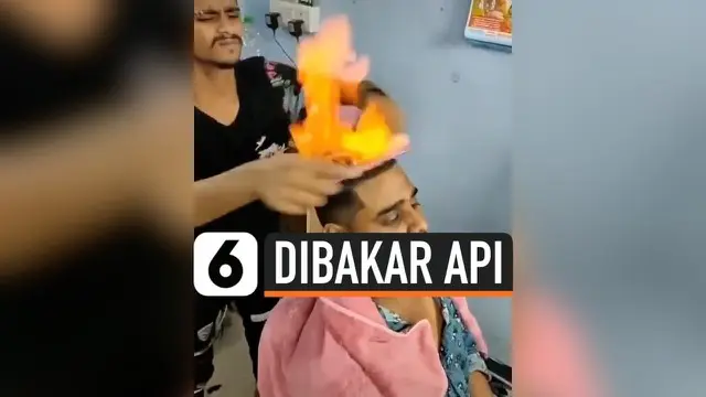 Sebuah salon di Mumbai, India, menawarkan sensasi cukur rambut yang tak biasa. Di sini, rambut pelanggan dicukur dalam keadaan terbakar api.