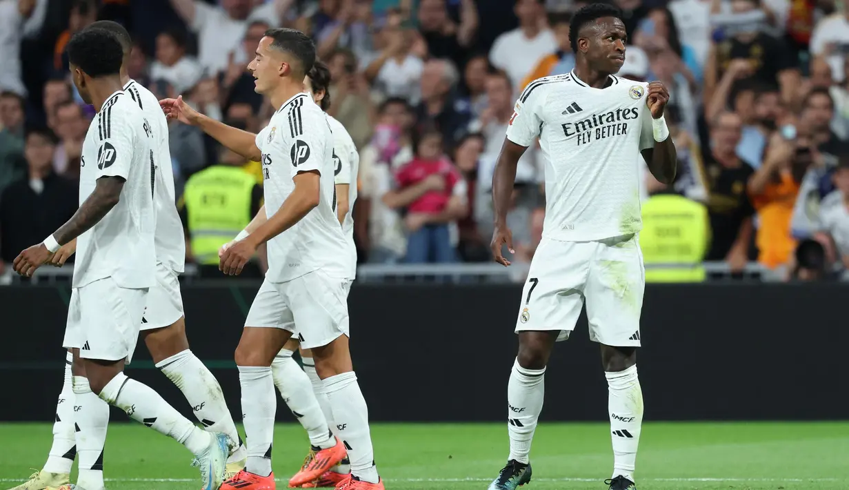 Tiga menit berselang atau pada menit ke-78, gol Vinicius Junior berhasil menambah keunggulan Real Madrid atas tim tamu Espanyol. (Thomas COEX/AFP)