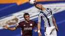 Pemain Leicester City, Timothy Castagne berebut bola dengan pemain West Bromwich Albion, Kieran Gibbs  pada pertandingan Liga Inggris di Hawthorns di West Bromwich, Inggris, Minggu, (13/9/2020). Leicester menang telak 3-0 atas West Bromwich Albion. (Tim Keeton/Pool via AP)