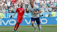Pemain Inggris Harry Kane melakukan selebrasi usai membobol gawang Panama dalam pertandingan Piala Dunia 2018 di Nizhny Novgorod Stadium, Rusia (24/6). (AP/Antonio Calanni)