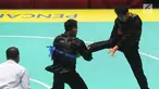 Pesilat Indonesia, Komang Harik Adi Putra (merah) melawan Mohd Al Jufferi Jamari (biru) asal Malaysia di final Kelas E Putra Asian Games 2018, Jakarta, Senin (27/8). Komang dinyatakan menang teknik atas Mohd Al Jufferi Jamari. (Merdeka.com/Arie Basuki)