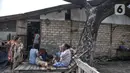 Aktivitas warga di perkampungan kumuh kawasan Semper, Cilincing, Jakarta, Selasa (12/10/2021). Data Badan Pusat Statistik (BPS) Provinsi DKI Jakarta per September 2021 mencatat, jumlah penduduk miskin di Ibu Kota mencapai 362 ribu jiwa. (merdeka.com/Iqbal S. Nugroho)