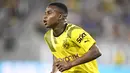 Borussia Dortmund tak pernah kehabisan stok striker muda. Setelah Erling Haaland pergi, mereka sekarang memiliki Youssoufa Moukoko. Pemain berusia 18 tahun itu mendapat bayaran 49,200 pounds per pekannya. (Denis Poroy/Getty Images/AFP)