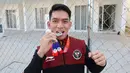 Poin Alfadhila Ramadhan masih lebih baik dari atlet asal Myanmar, Oo Chit Hlain yang mengoleksi 7,33 poin dan berhak atas medali perunggu. (Bola.com/Abdul Aziz)
