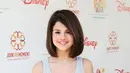 Pada tahun 2009. Selena Gomez tampil imut dengan gaya rambut bob. (Frederick M. Brown/Getty Images)