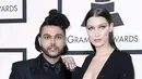 Terkait fotografer yang bermesraan dengan Bella Hadid saat berpesta usai London Fashion Week, sampai saat ini belum diketahui soal hubungan keduanya dan kebenarannya seperti apa. (doc.dailymail.com)