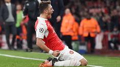 Mesut Ozil merayakan gol yang dicetaknya di menit akhir ke gawang Bayern Munchen dalam laga Grup F Liga Champions di Stadion Emirates, London, Rabu (21/10/2015) dini hari WIB. (EPA/Andy Rain)