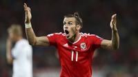 Ekspresi Gareth Bale saat melawan Austria pada laga Group D kualifikasi Piala Dunia 2018 di Cardiff City Stadium, Cardiff, (2/8/2017). Wales menang 1-0. (David Davies/PA via AP)
