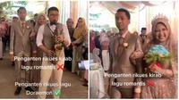 Viral Video Resepsi Pernikahan Ini Diiringi Lagu Doraemon, Bikin Netizen Heran (sumber: Twitter/ence_dwi)