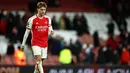 Martin Odegaard merupakan kapten Arsenal saat ini. Gelandang asal Norwegia tersebut sekarang tercatat memakai nomor punggung 8 di Emirates Stadium. Odegaard sudah pernah mengenakan nomor punggung 10 sebelumnya. Dia memakai nomor itu saat bermain di Heerenveen, Real Madrid Castilla dan timnas Norwegia saat ini. (HENRY NICHOLLS / AFP)