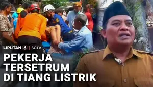 Pekerja Tersetrum di Tiang Listrik