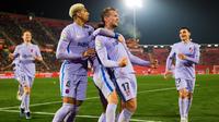 Barcelona meraih kemenangan 1-0 atas Real Mallorca pada laga pekan ke-19 La Liga di Camp Nou, Senin (3/1/2021) dini hari WIB. Gol tunggal kemenangan Barca disarangkan Luuk de Jong pada menit ke-44. (AFP/Jaime Reina)