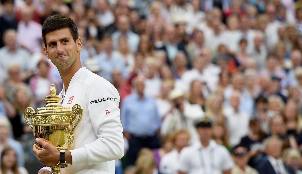  Ini adalah gelar Grand Slam ke-9 dan yang ketiga di Wimbledon bagi Djokovic. (EPA/ANDY RAIN)